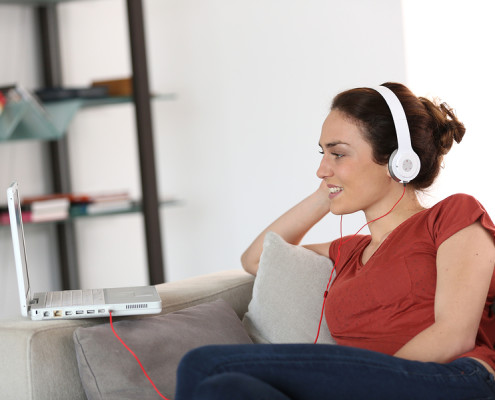 a woman learning a language online